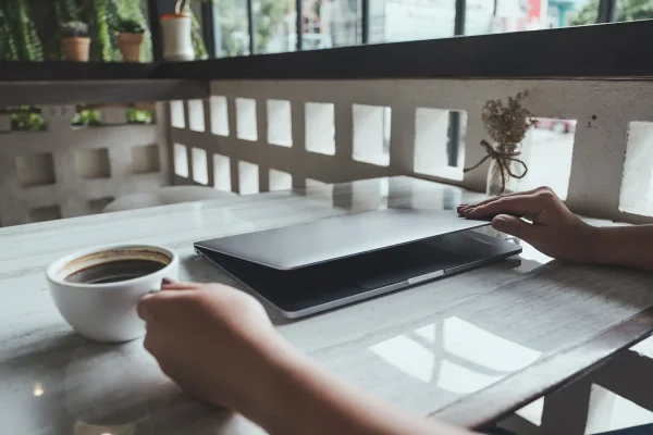 Laptop with a cup of coffee